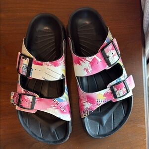 Birkis (Birkenstock) sandals- great for summer with hard rubber bottom